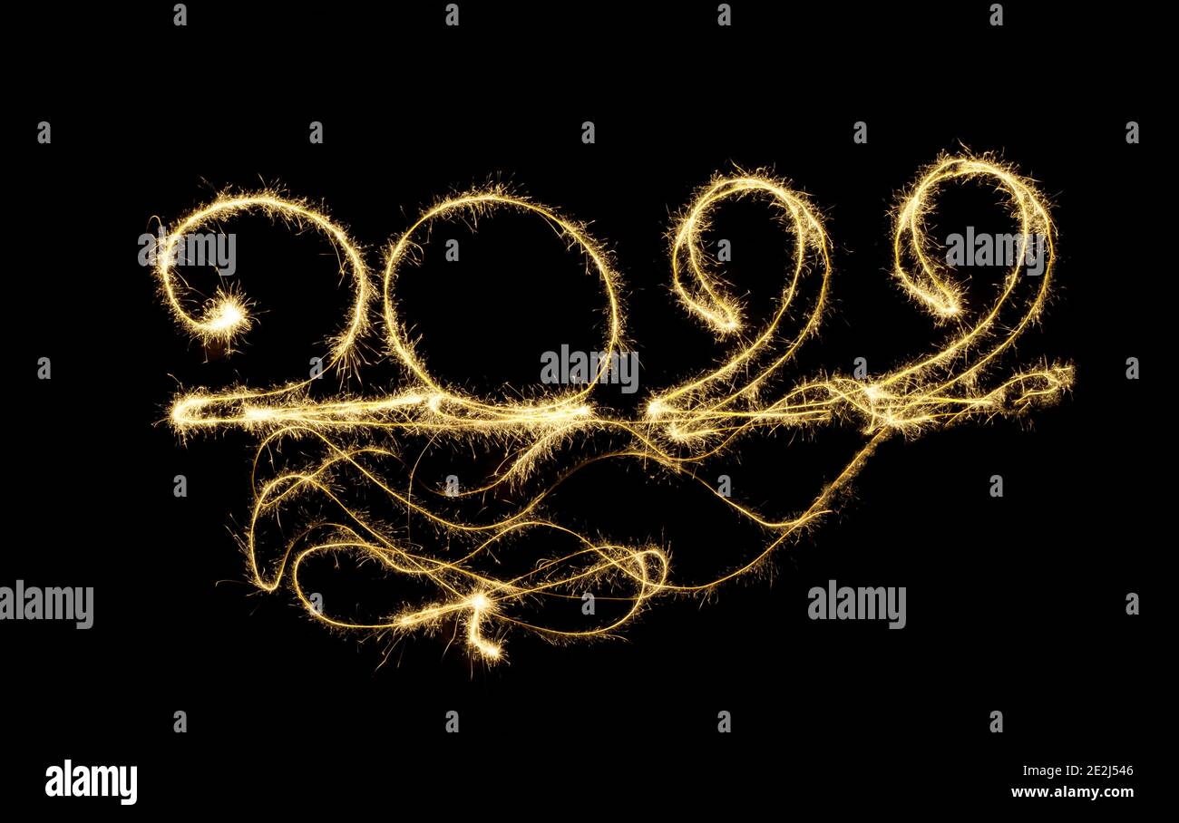 Magic Of Christmas 2022 Happy New Year 2022. Drawing At Night With Sparklers. Numbers 2022. Long  Exposure In The Photo. The Magic Of Christmas New Year Holidays.  Congratulati Stock Photo - Alamy