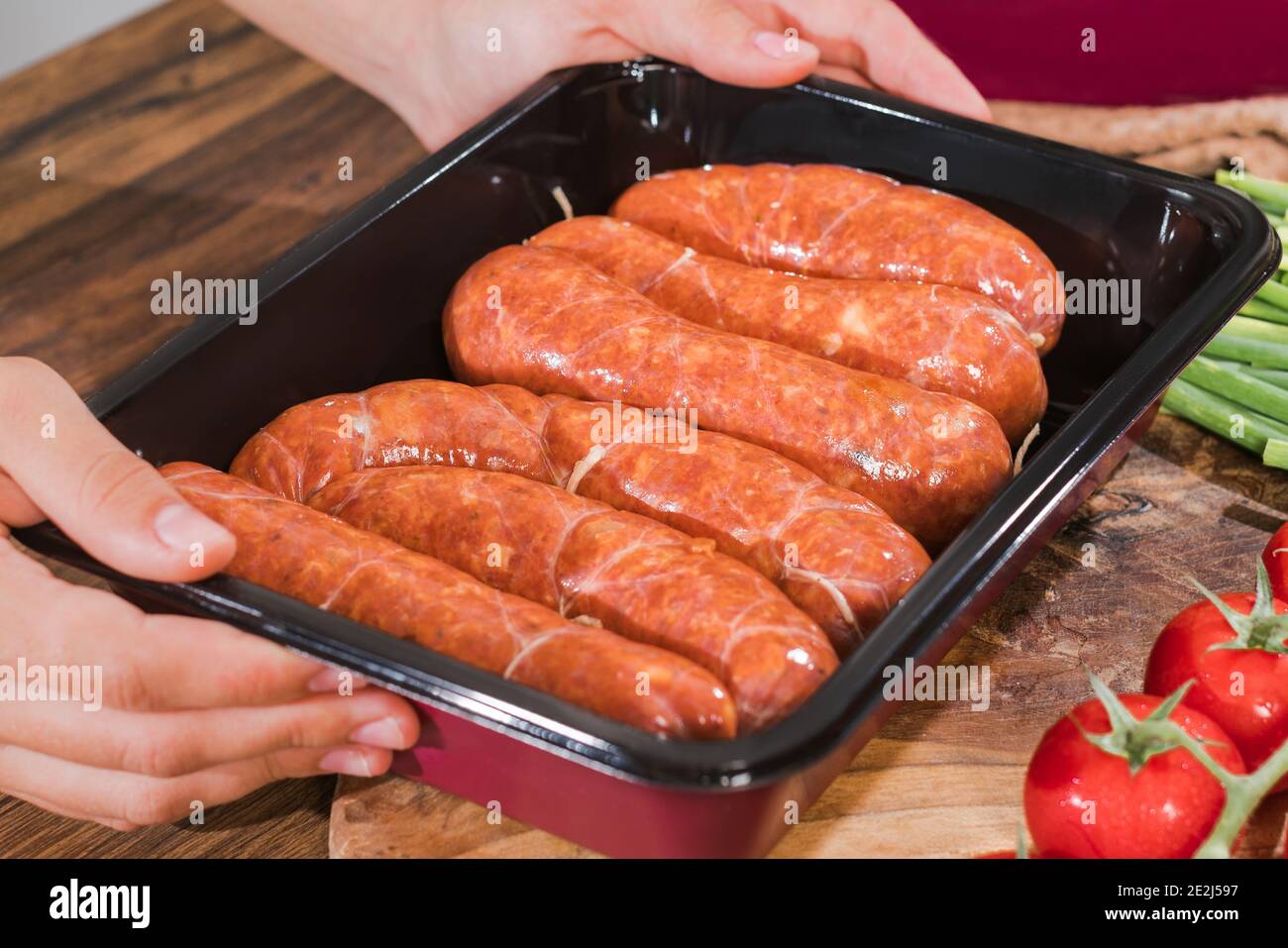 Grilled sausages in a casserole dish. Convenience food, precooked.The