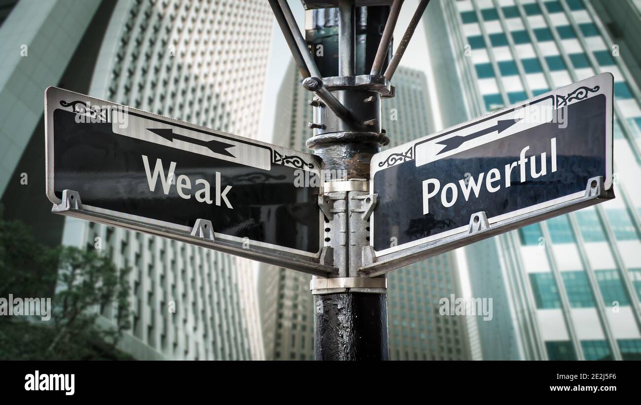 Street Sign the Direction Way to Powerful versus Weak Stock Photo - Alamy