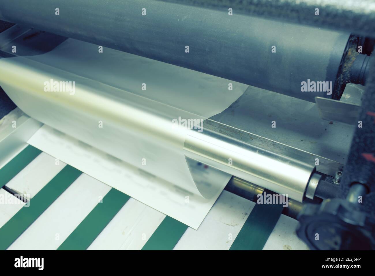 Laminating unit in the print shop. Stock Photo