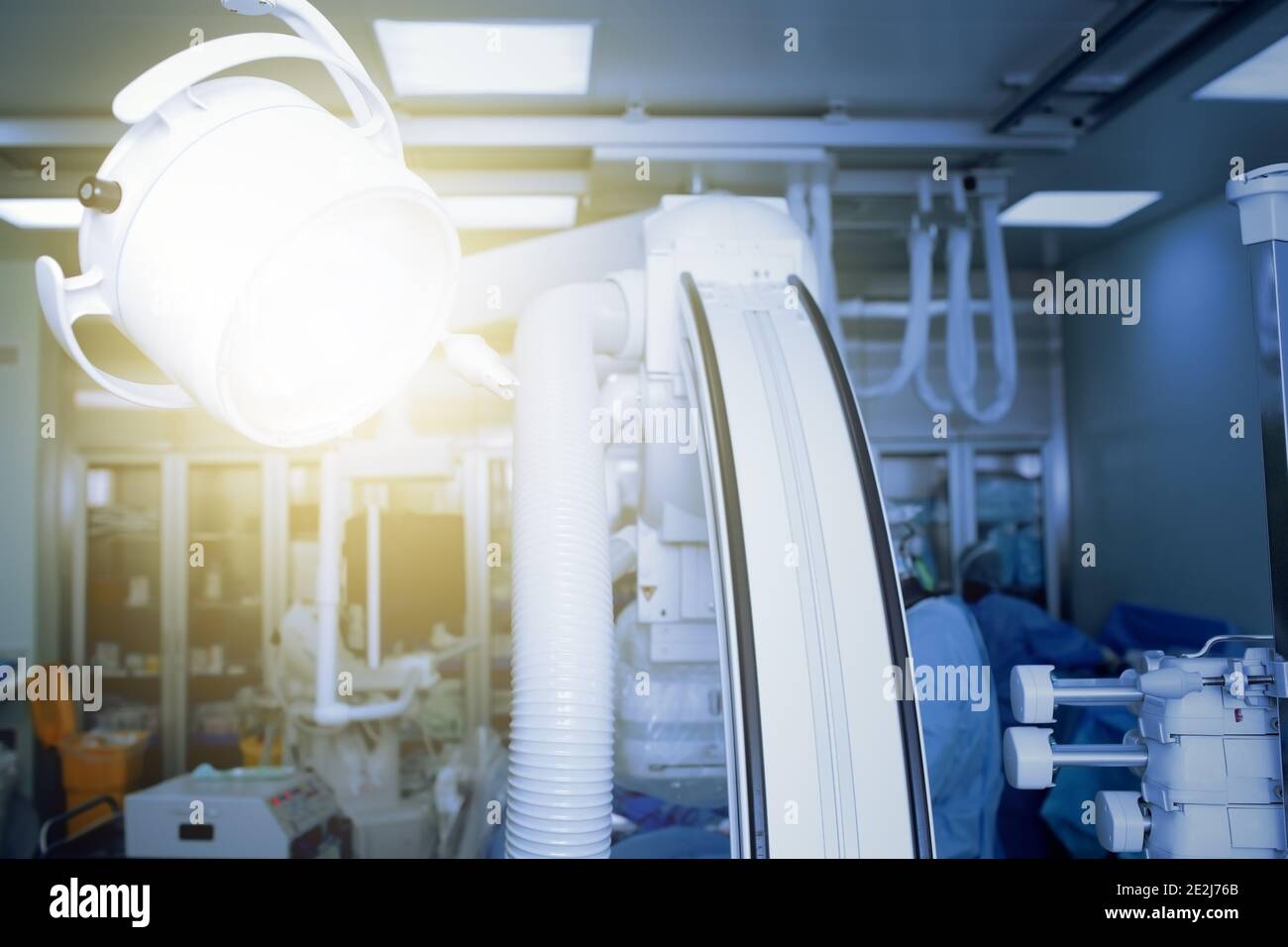 Working doctors in modern equipped cathlab. Stock Photo