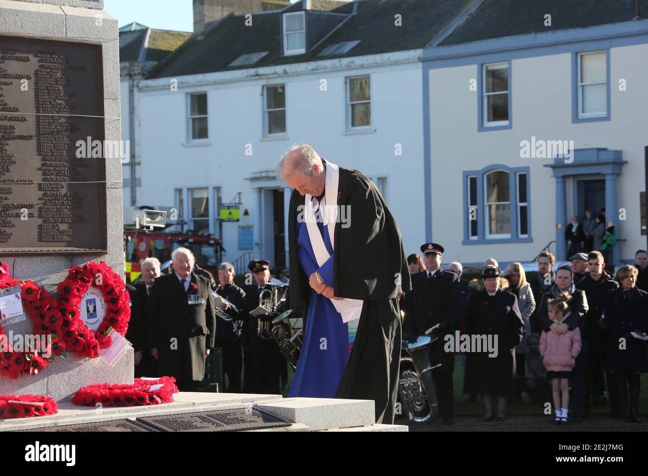 Ayr, Ayrshire, Scotland. Armistace Day Wellington Square. A short service was held by  the Rev David Gemmel with representatives from the armed forces, Police Scotland, Scottish Fire & Rescue, South Ayrshire Council and Belmont Academy placeing wreaths at the Cenotaph Stock Photo