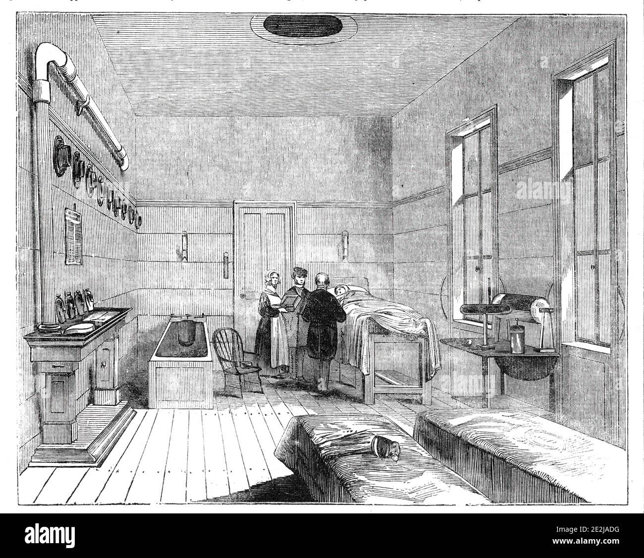 Ward of the Receiving-House of the Royal Humane Society, 1844. Facilities of the Royal Humane Society, 'for the recovery of persons apparently drowned or dead', at Hyde Park in London. Inside there was '...a room for medical attendants on the left, and waiting-room on the right; parallel with which are two separate wards for the reception of male and female patients. Each contains beds warmed with hot water, a bath, and a hot-water, metal-topped table for heating flannels, bricks, &amp;c.; the supply of water being by pipes around the walls and beneath the floor of the rooms. Next are a kitche Stock Photo