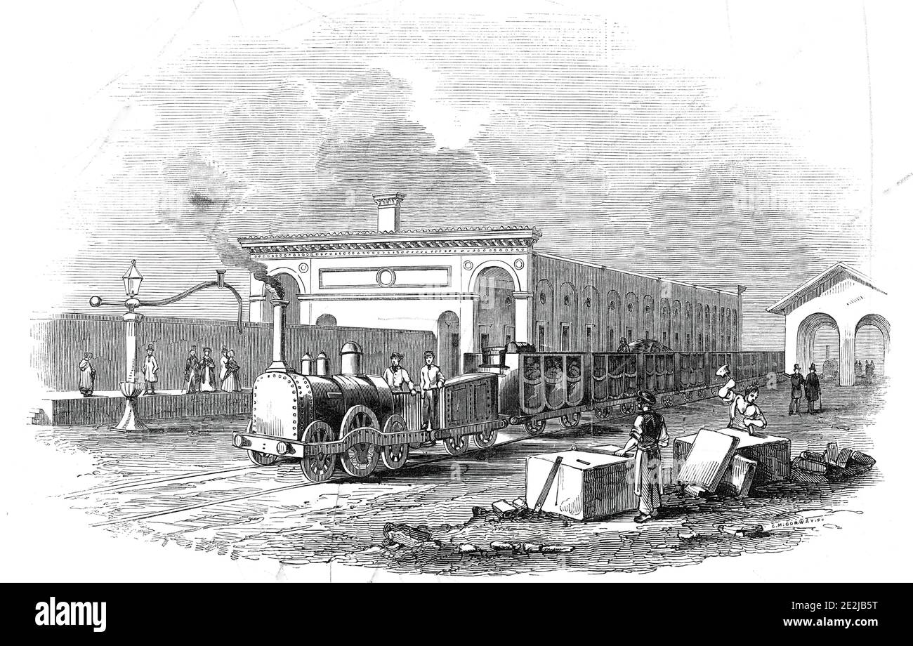 Cambridge Station, 1845. The railway terminus at Cambridge on the newly opened line from London to Cambridge and Ely. 'The train reached the station at Cambridge at half-past eleven o'clock, having passed over fifty-seven and a quarter miles in two hours and forty minutes, the rate of speed, allowing for stoppages, being more than twenty- eight miles an hour!'. The station '...is a light and elegant structure, yet sufficiently substantial for all the purposes for which it is intended. There are within, commodious waiting-rooms, offices, places for luggage; and, in a word, all that is requisite Stock Photo
