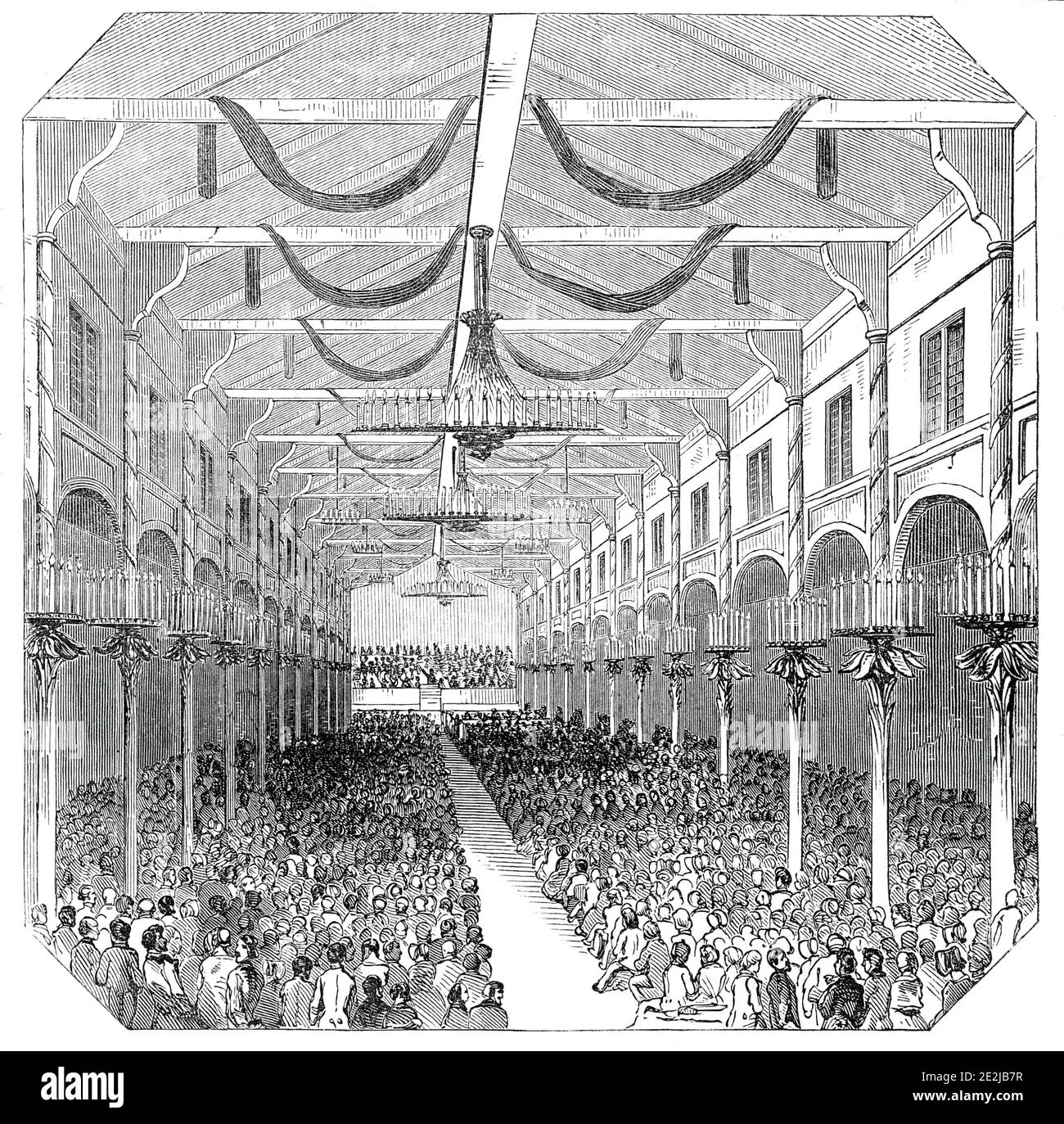 Concert at the Beethoven Hall, 1845. Queen Victoria attends a concert in Bonn during a royal visit to Germany. 'The Kunstler Concert, or artists' concert, the last of the musical performances, was announced for nine o'clock yesterday morning. On entering the Beethoven Hall I found it crowded to excess. To the left of the orchestra a stage had, been erected, elegantly fitted up with glasses, carpets, state chairs, &amp;c., for the expected visit of Royalty. Ten o'clock, however, having arrived, and the audience becoming impatient, [Franz] Liszt began his &quot;Festkantate,&quot; composed in hon Stock Photo