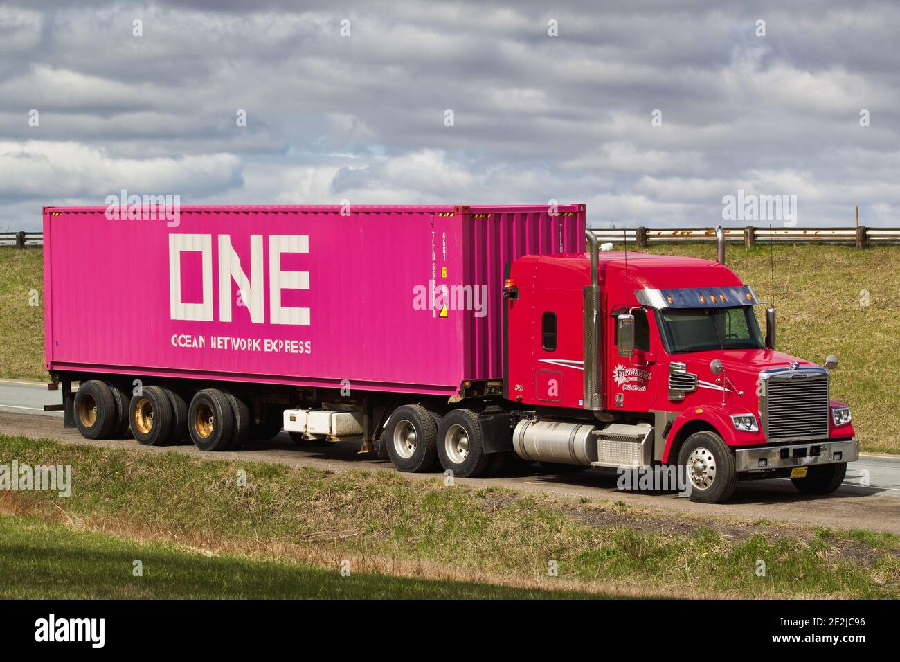 Stewiacke, Canada - May 09, 2019: Parked semi truck with ONE or Ocean Network Express Container. Ocean Network Express is a Japanese container shippin Stock Photo