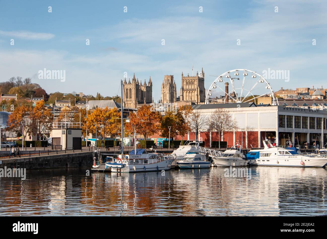 A view of the harbour with the cathedral and University building in the background; Bristol UK Stock Photo