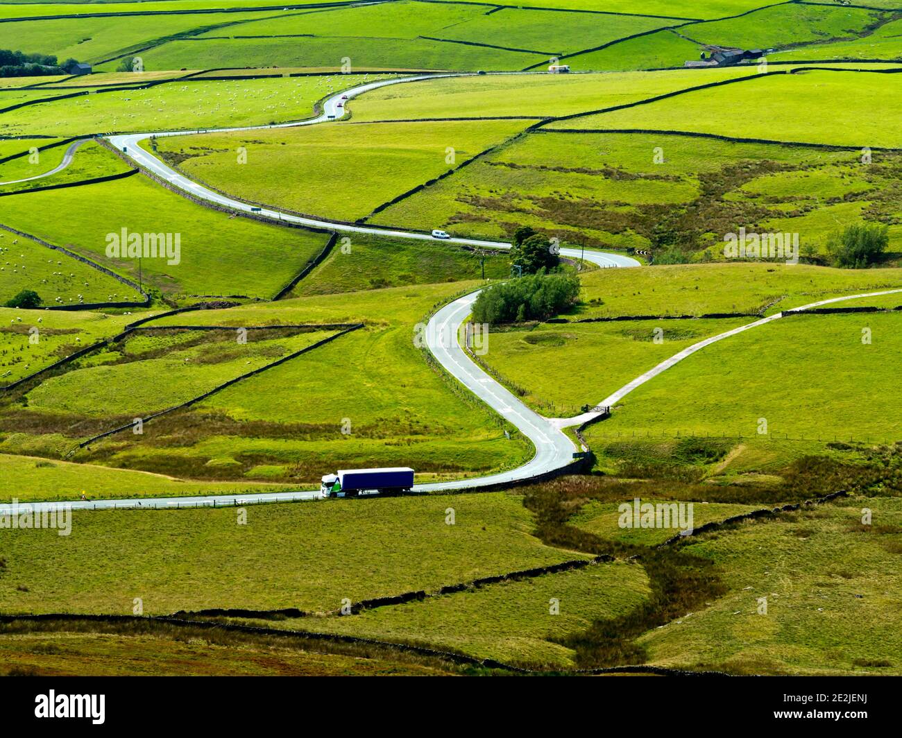View looking down on the winding A537 road which runs between Buxton and Macclesfield on the Derbyshire and Cheshire border Peak District England UK Stock Photo