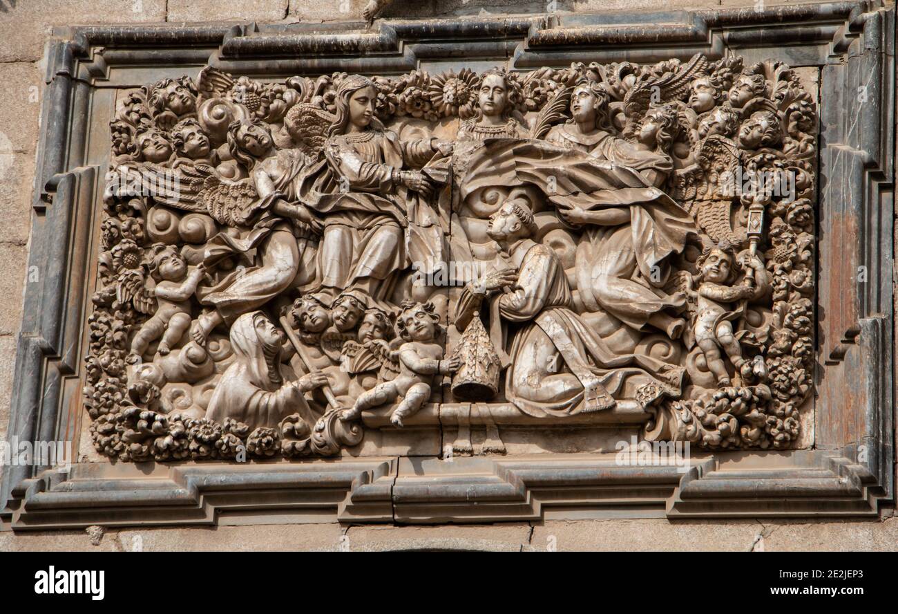 Baroque relief carving on the facade of St Ildefonso (the Jesuit church), Toledo, Spain Stock Photo