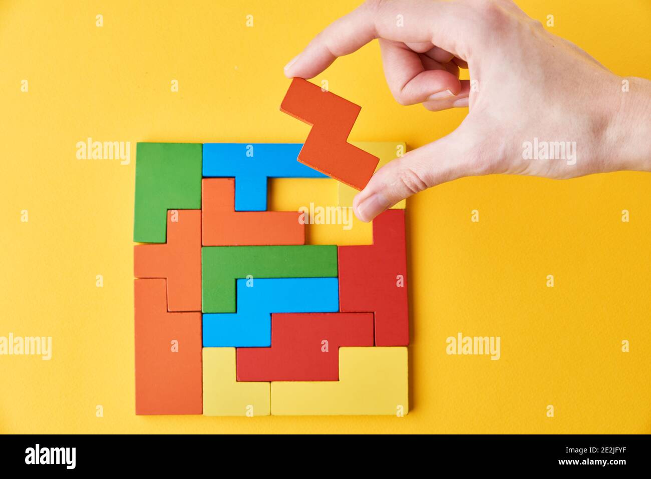 Logical Thinking And Finishing Task Concept Woman Hand Adding Last Missing Wooden Block To Finish A Puzzle Stock Photo Alamy Logical Thinking And Finishing Task Concept Woman Hand Adding Last Missing Wooden Block To Finish A Puzzle Stock Photo Alamy
