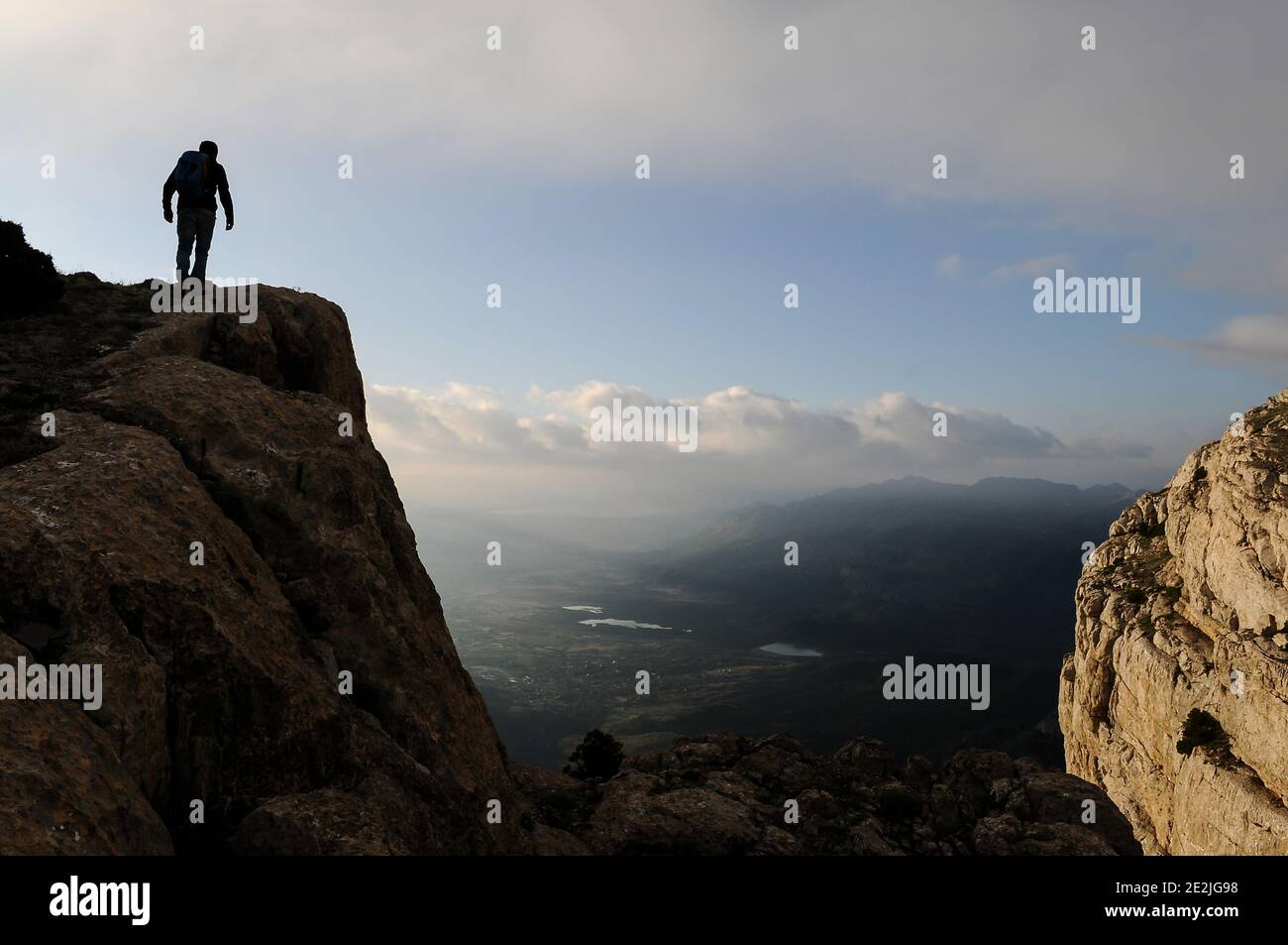 dangerous and cliff high mountain climber Stock Photo Alamy
