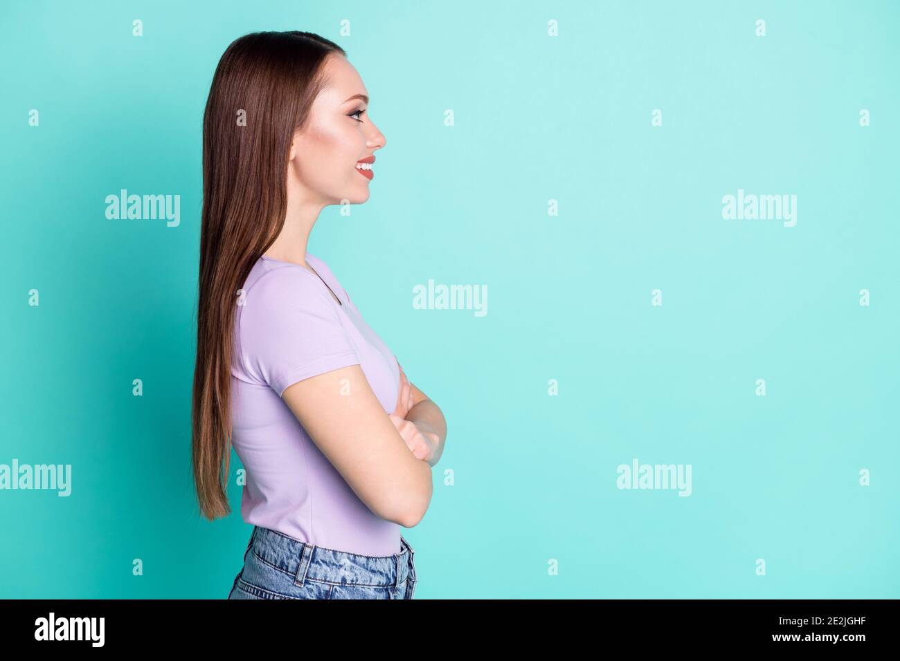 Side profile photo of girl with crossed hands looking at empty space ...