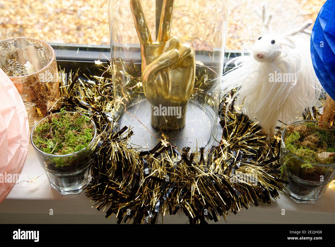 A window sill with Christmas decorations. Stock Photo