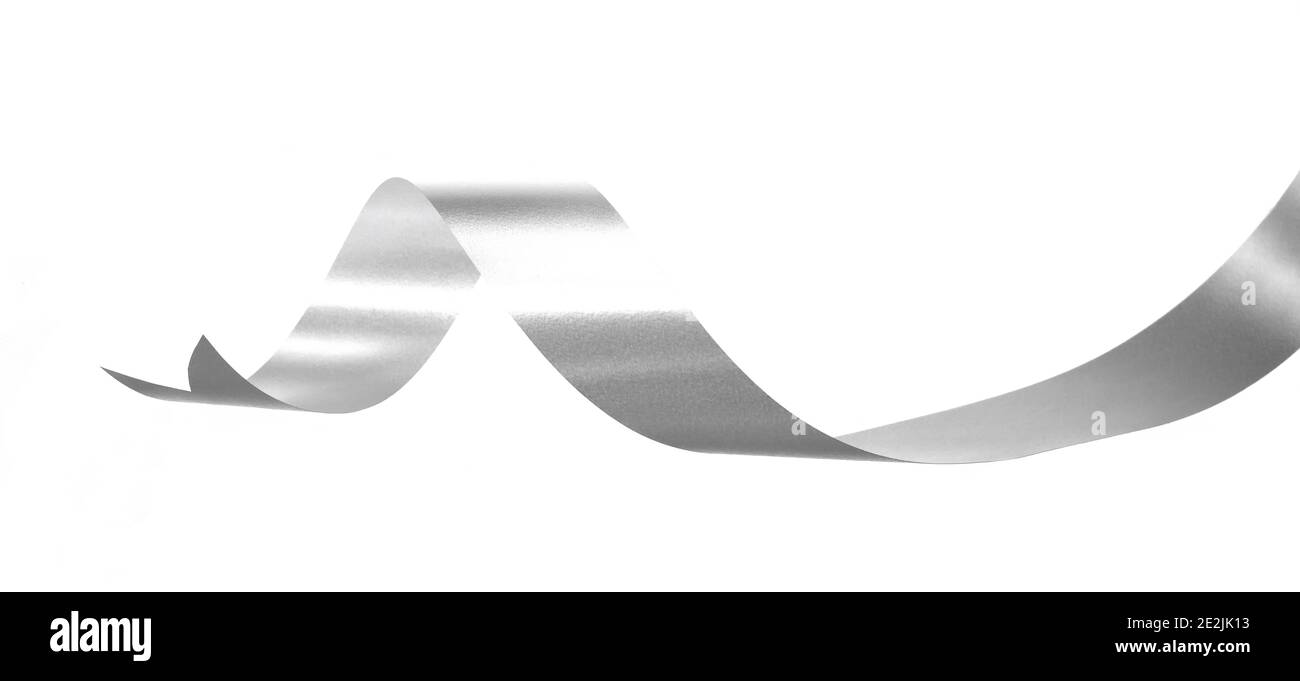 Silver ribbon and roll isolated on white background. Flat lay Stock ...