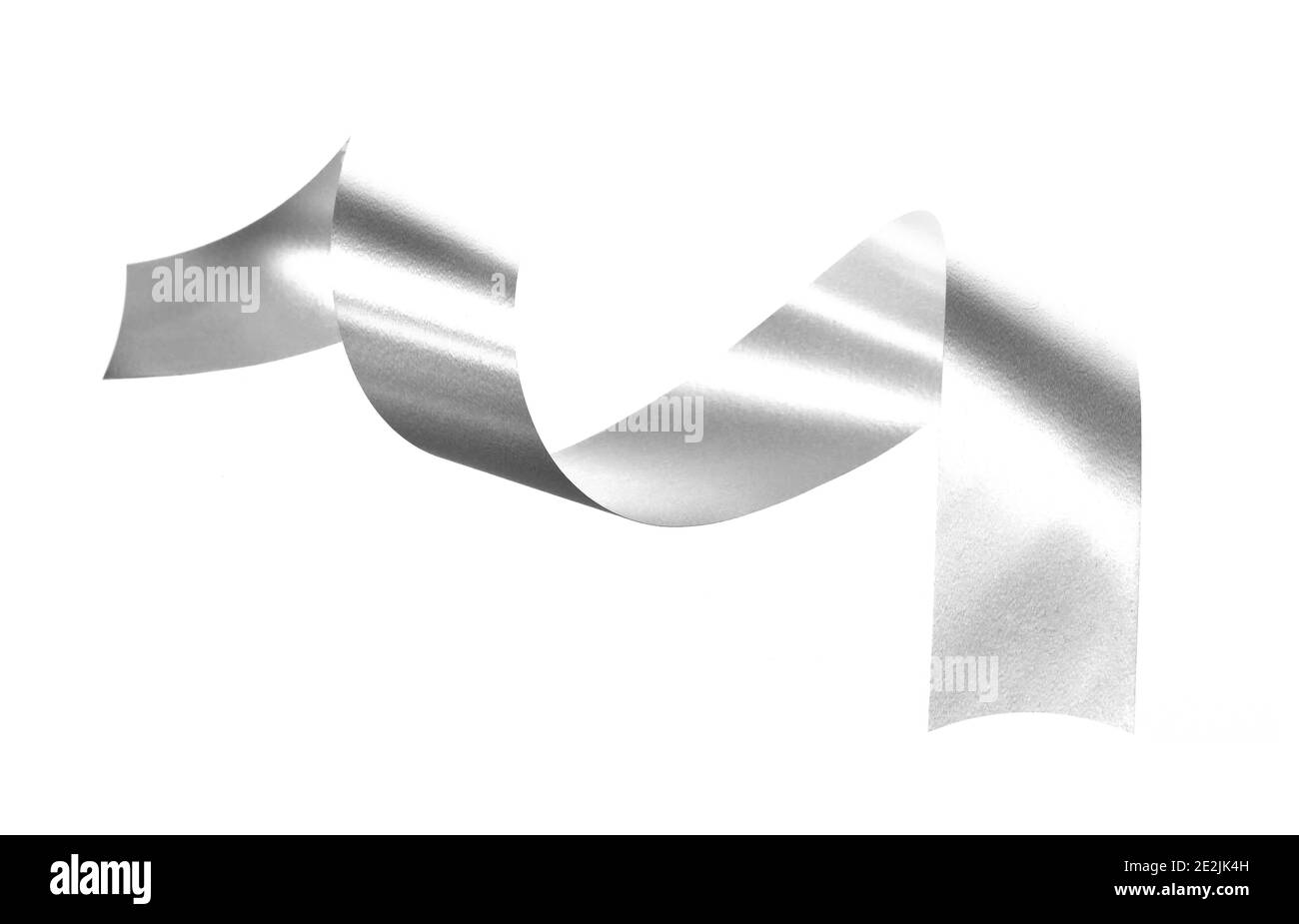 Silver ribbon and roll isolated on white background. Flat lay Stock ...