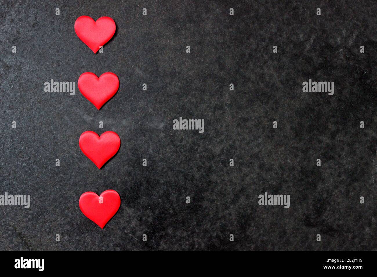 St. Valentine day background. Red heart on dark background Stock Photo ...