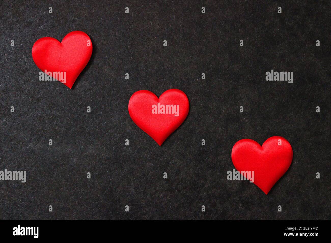 St. Valentine day background. Red heart on dark background Stock Photo ...