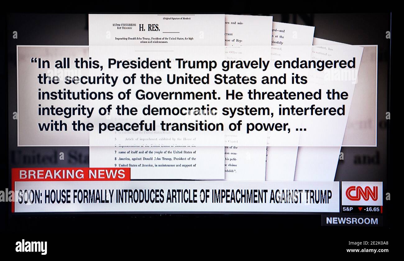 A CNN television 'Breaking News' screen shot of the article of impeachment against U.S. President Donald Trump. Stock Photo