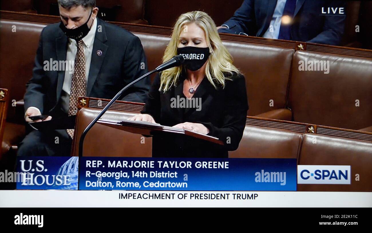 C-SPAN television screen shot shows U.S. Rep. Marjorie Taylor Green defending U.S. President Donald Trump at his second impeachment debate. Stock Photo