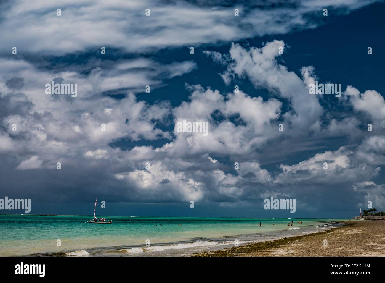 Sky of large clouds and clear waters of Maceió, Brazil Stock Photo