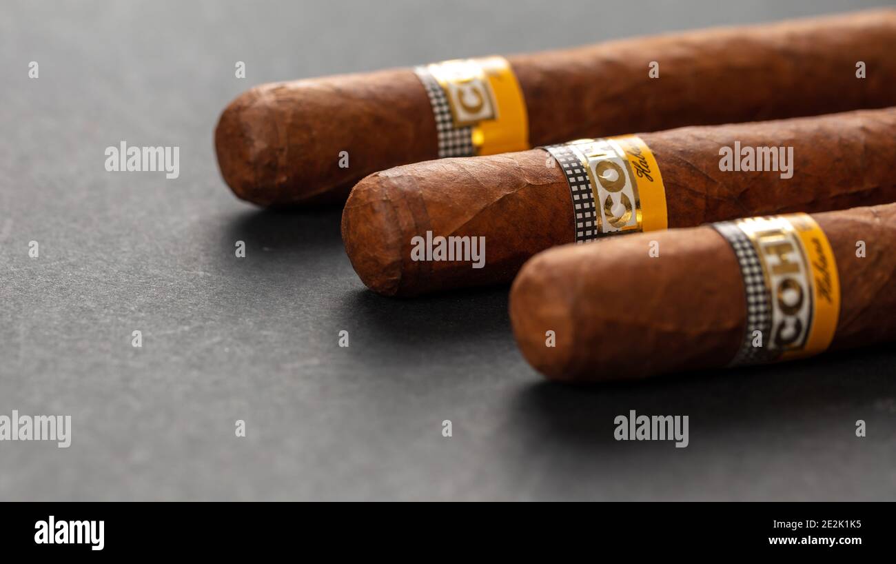 Athens Greece, December 30, 2020. Cohiba Cigars. Cuban premium quality robustos on black background, closeup view Stock Photo