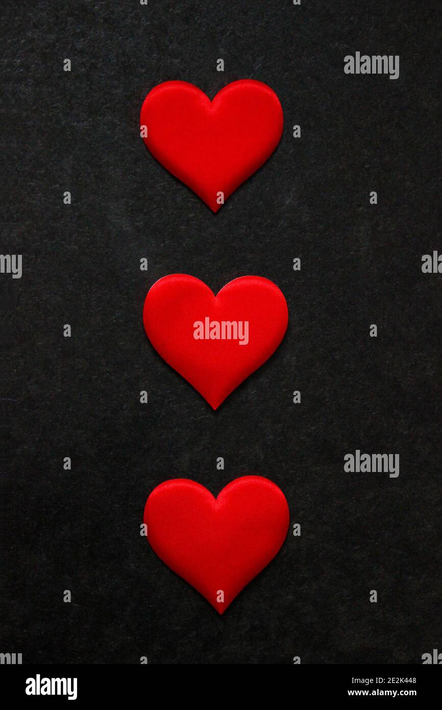 St. Valentine day background. Red heart on dark background Stock Photo ...