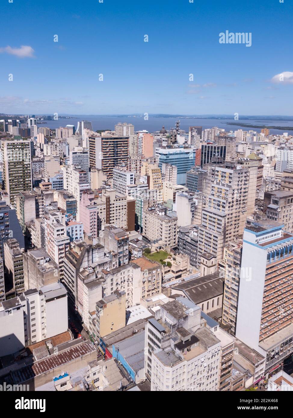 Drone aerial view of buildings skyline of Porto Alegre city, Rio Grande do Sul state, Brazil. Beautiful sunny summer day with blue sky. Urban concept. Stock Photo