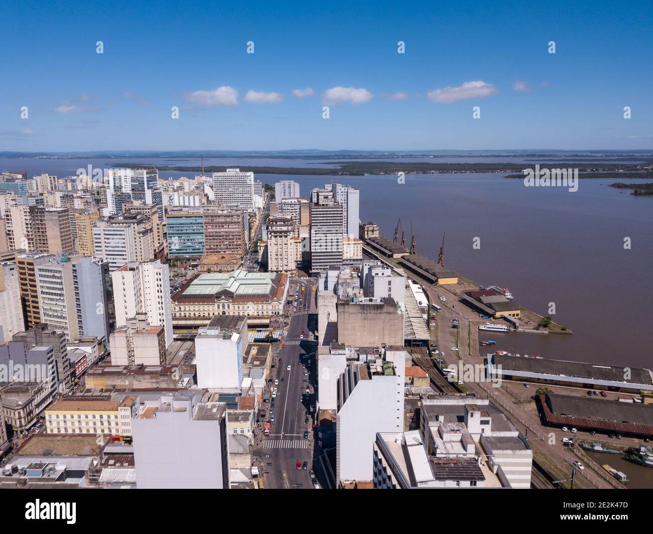 Drone aerial view of Guaiba river, port, buildings, market, streets and skyline of Porto Alegre city, Rio Grande do Sul state, Brazil. Concept of urba Stock Photo