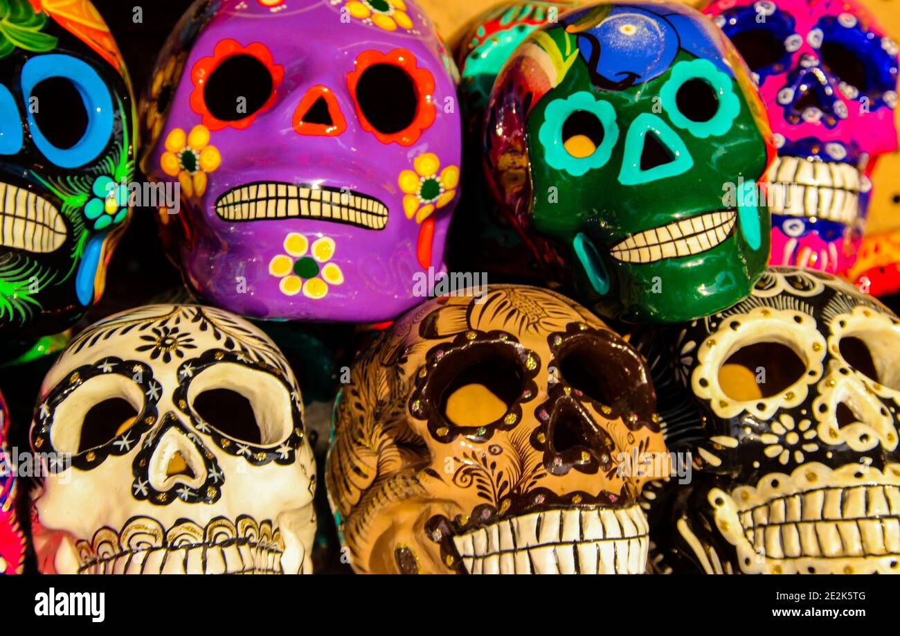 Calacas, wooden skull Day of the Dead masks on market in Cabo San Lucas, Mexico Stock Photo