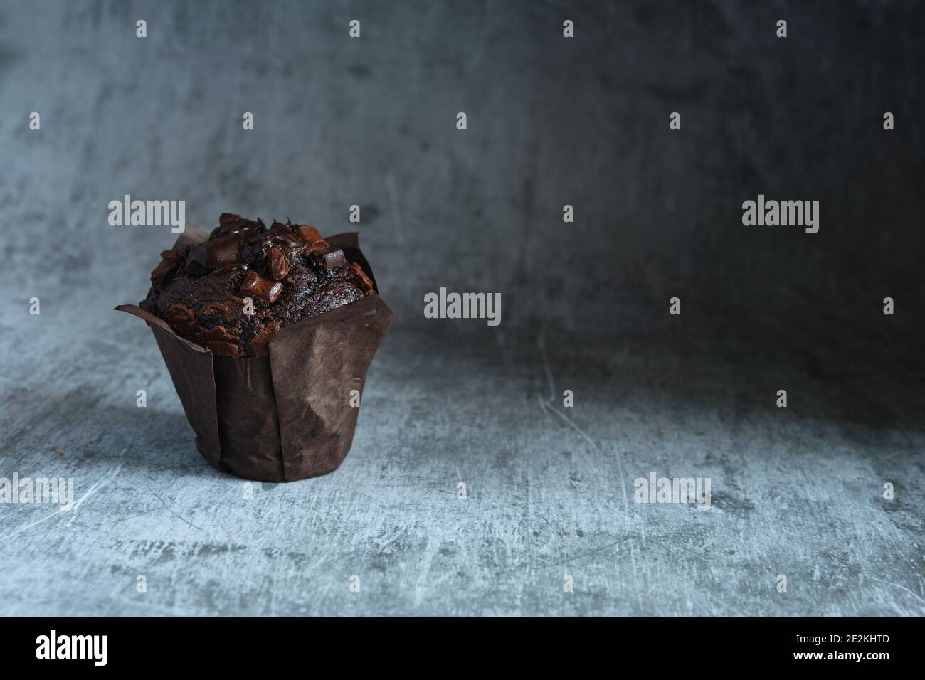chocolate muffins on a dark background Stock Photo