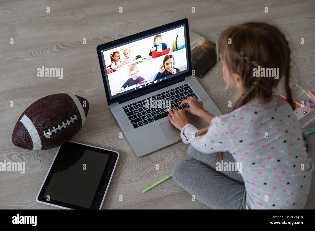 A Girl Video Conferencing With Happy Female Teacher On Laptop Stock ...