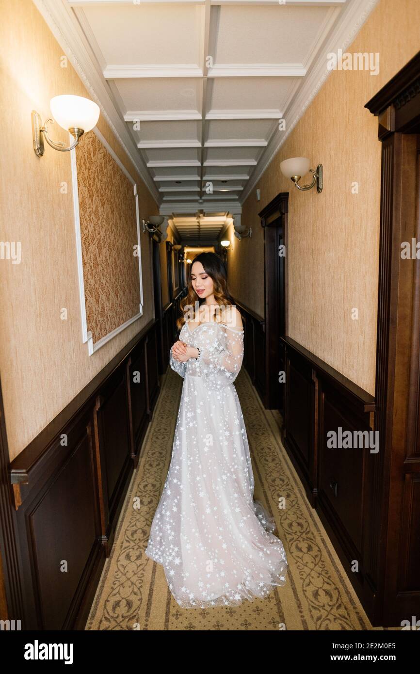 Bride from Asia, Vietnam at the hotel interior, wedding preparing Stock Photo