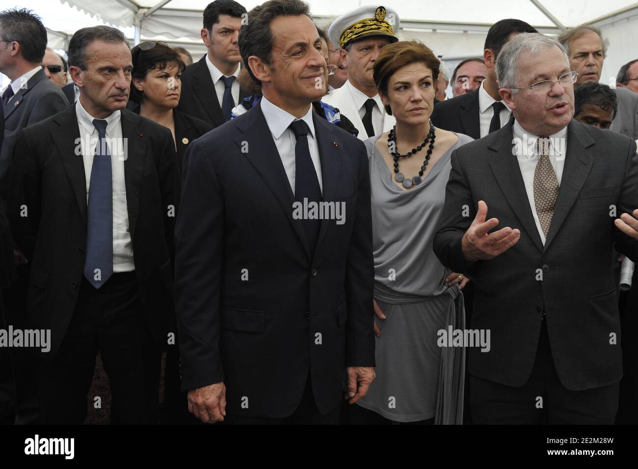 French President Nicolas Sarkozy (2nd L) alongside President of French energy giant EDF (Electricite de France) Henri Proglio (L) and Junior Minister for Ecology Chantal Jouanno (2nd R) tours the AKUO photovoltaic site in Saint-Pierre, French overseas department La Reunion, on January 19, 2010, during his official two-day trip to the Indian Ocean. Photo by Elodie Gregoire/ABACAPRESS.COM Stock Photo