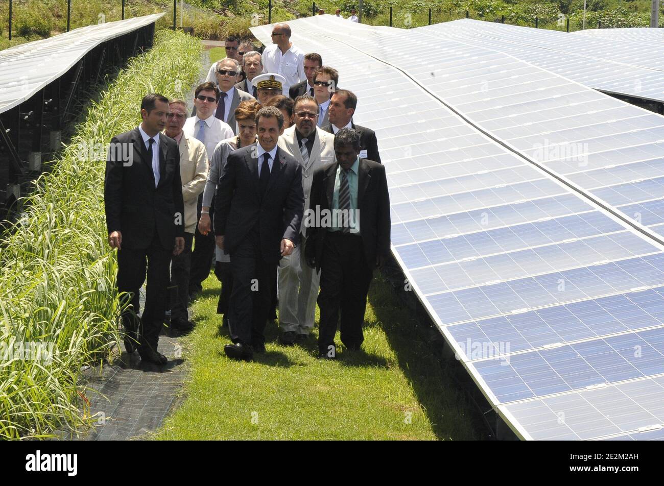 French President Nicolas Sarkozy (C), alongside President of French energy giant EDF (Electricite de France) Henri Proglio, French carmaker Renault's COO Patrick Pelata, French Junior Minister for Ecology Chantal Jouanno and French overseas territories and Departments Minister Marie-Luce Penchard, tours the AKUO photovoltaic site in Saint-Pierre, French overseas department La Reunion, on January 19, 2010, during his official two-day trip to the Indian Ocean. Photo by Elodie Gregoire/ABACAPRESS.COM Stock Photo