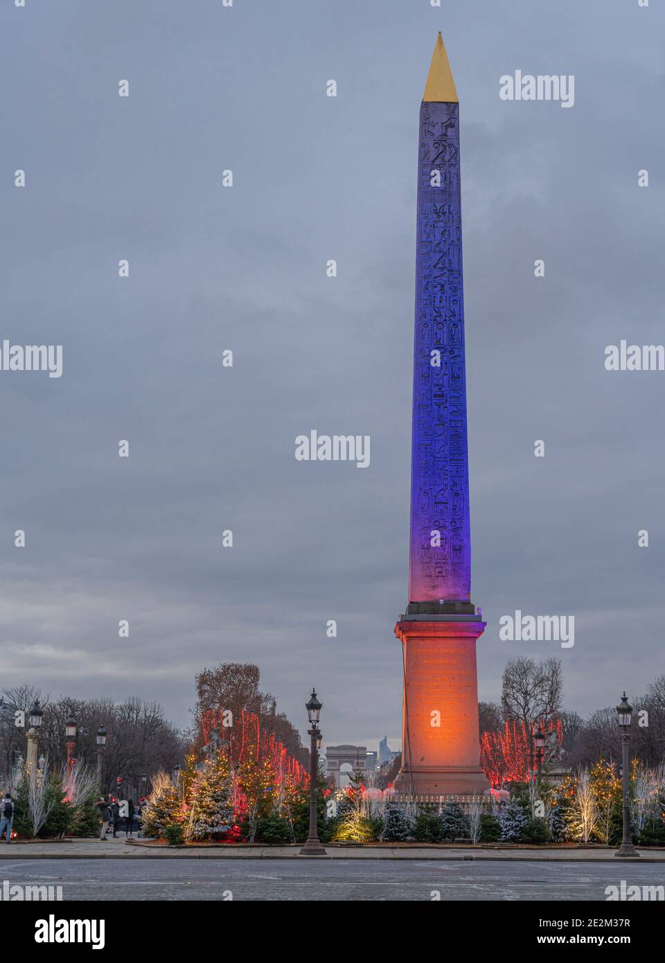 Paris,France - 12 30 2020: View of the Obelisk and the Arc De Triomphe on Place de la Concorde with Christmas lights Stock Photo