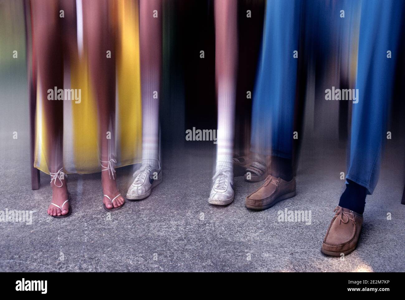 1990s STRETCHED DISTORTED LONG LEGS OF THREE PEOPLE FROM KNEES DOWN ...