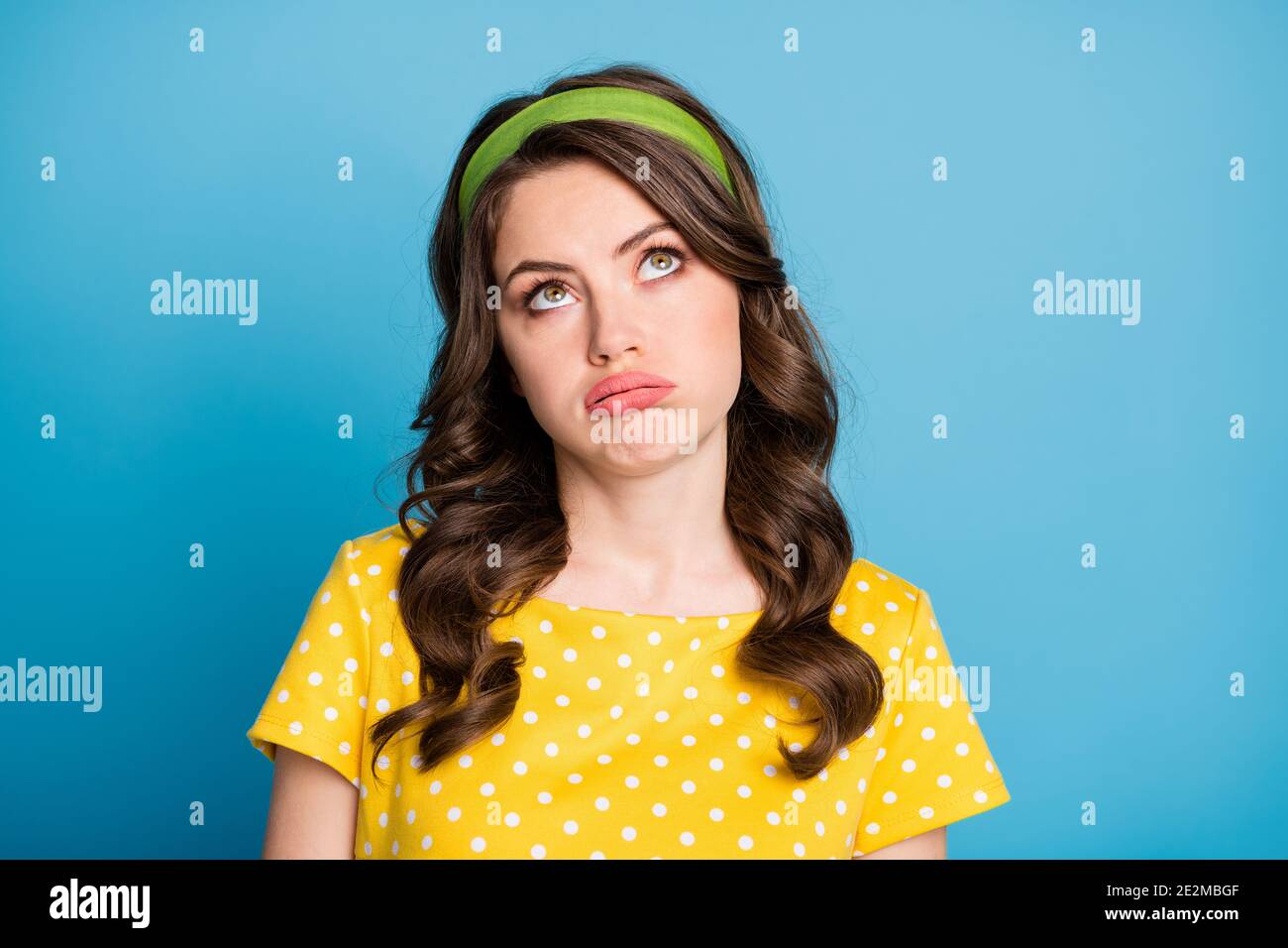 Photo of frustrated tired girl rolling eyes look copyspace sighing