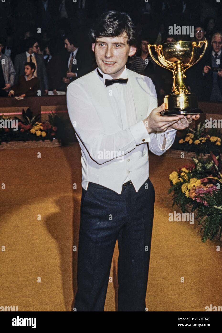 LONDON - ENGLAND 22/29 JAN 84. Jimmy White receives the winners trophy at the Benson & Hedges Masters snooker tournament at the Wembley Conference Cen Stock Photo