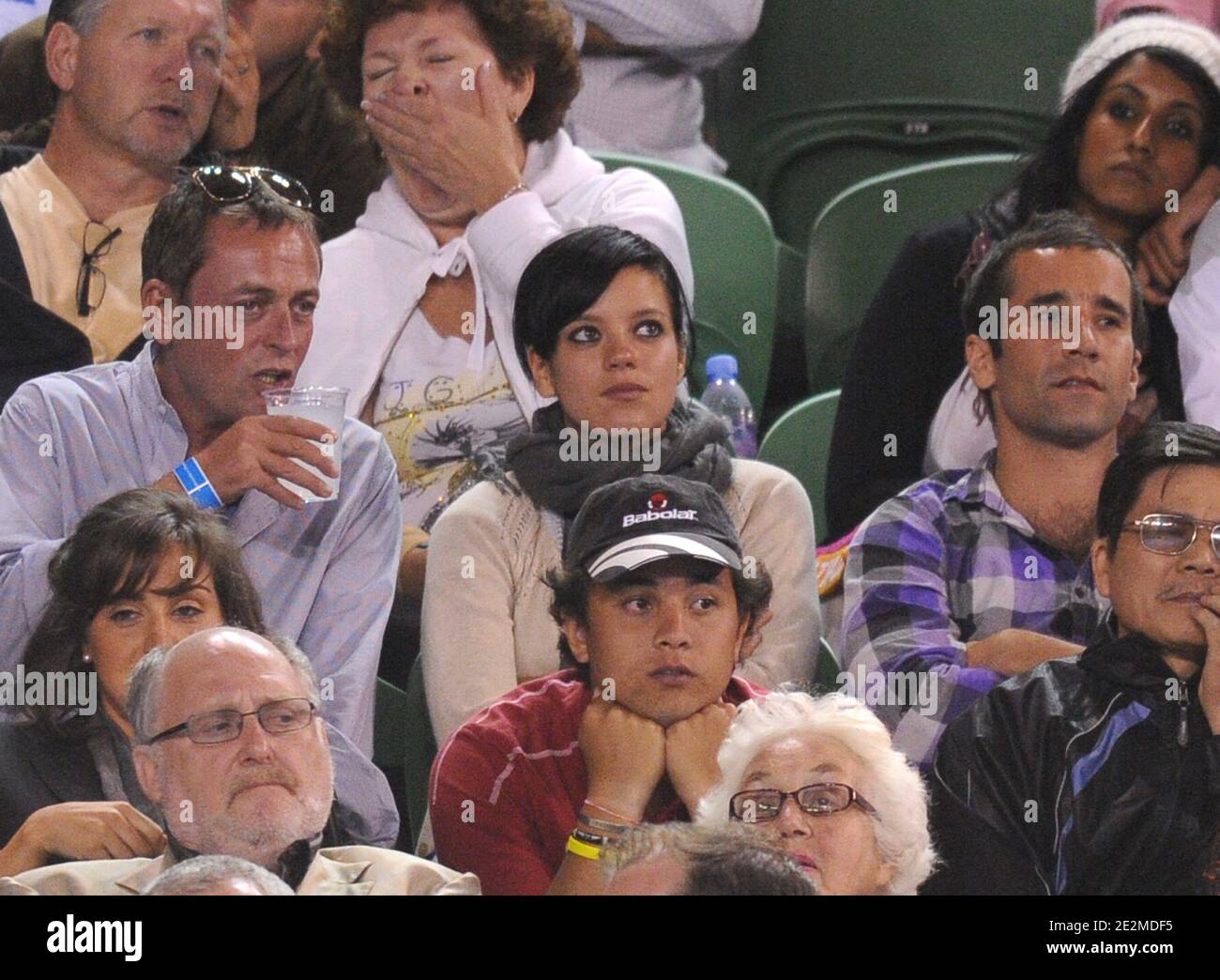 British singer Lily Allen watches the quarterfinal match between France's Jo-Wilfried Tsonga against Serbia's Novak Djokovic on day 10 of the Australian Open tennis tournament in Melbourne, Australia on January 27, 2010. Jo-Wilfried Tsonga moved into the Australian Open semi-finals. Photo by Corinne Dubreuil/Cameleon/ABACAPRESS.COM Stock Photo