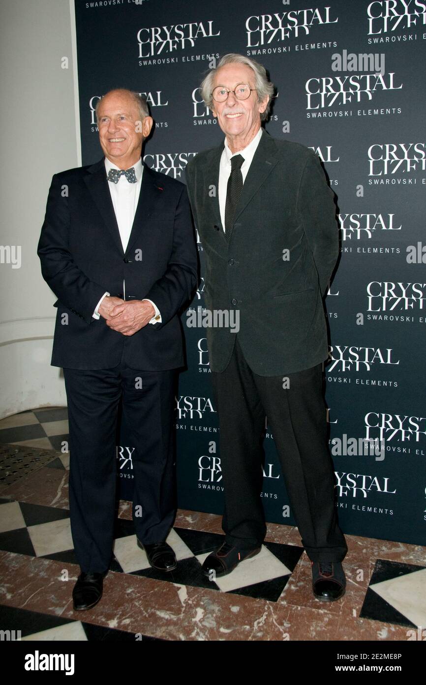 The President of the Ligue nationale contre le cancer Francis Larra and actor Jean Rochefort at the Crystallized Swarovski Elements Ways to say black Exhibition and Party at Hotel Pozzo di Borgo in Paris, France on January 27, 2010. Photo by Mireille Ampilhac/ABACAPRESS.COM Stock Photo