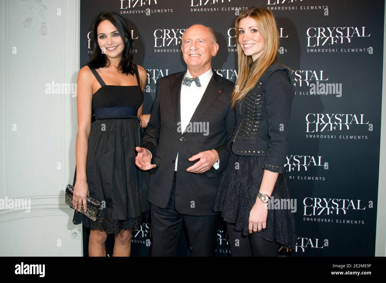 Valerie Begue and Alexandra Rosenfeld posing with the President of the Ligue nationale contre le cancer Francis Larra at the Crystallized Swarovski Elements Ways to say black Exhibition and Party at Hotel Pozzo di Borgo in Paris, France on January 27, 2010. Photo by Mireille Ampilhac/ABACAPRESS.COM Stock Photo