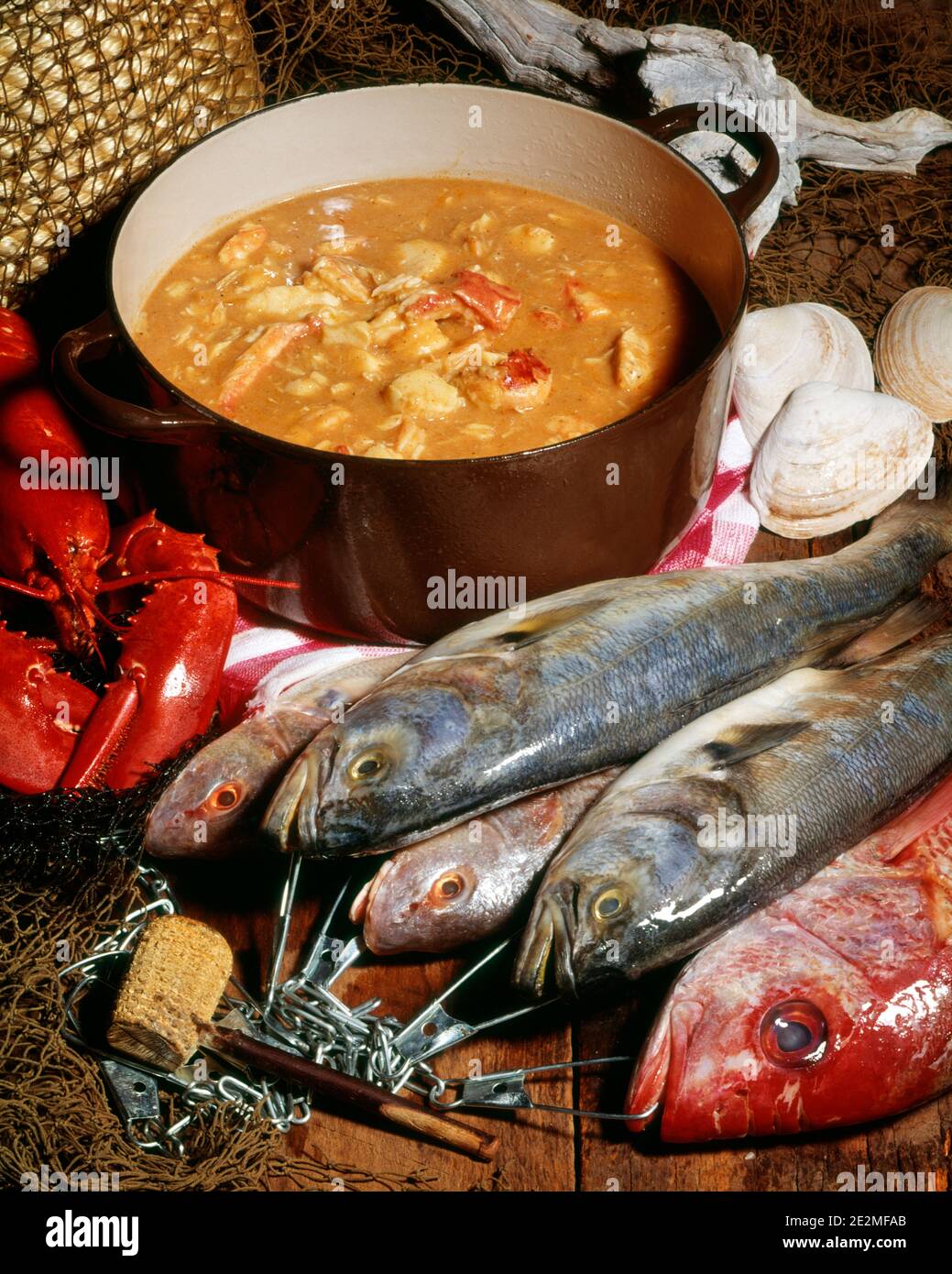1980s POT OF FISH CHOWDER INCLUDES FISH LOBSTER AND CLAMS ALONGSIDE ...