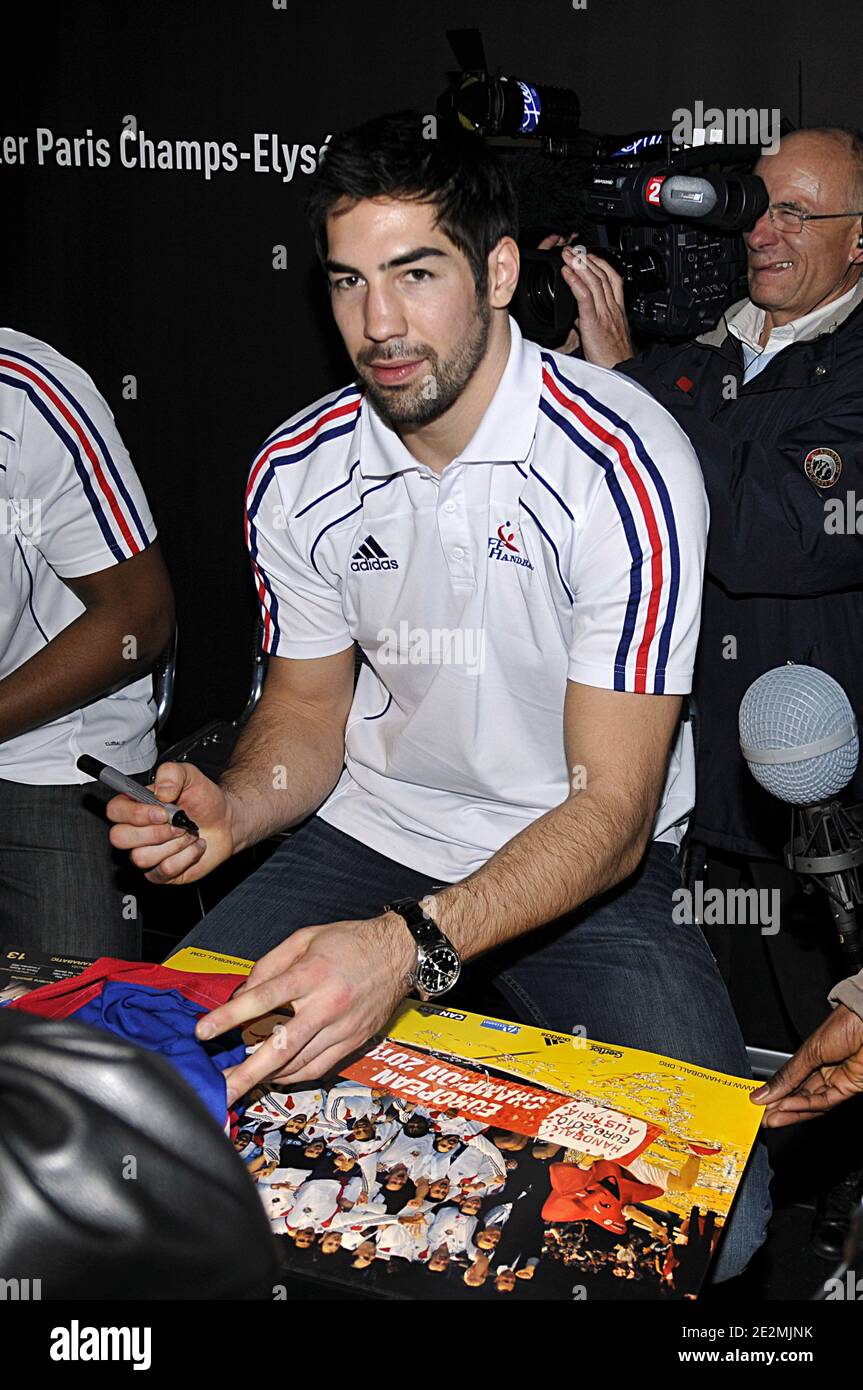 France's handball player Nikola Karabatic during a autographs session and  press conference at Adidas Store on on the Champs Elysees avenue in Paris,  France on February 1, 2010 after winning the EHF