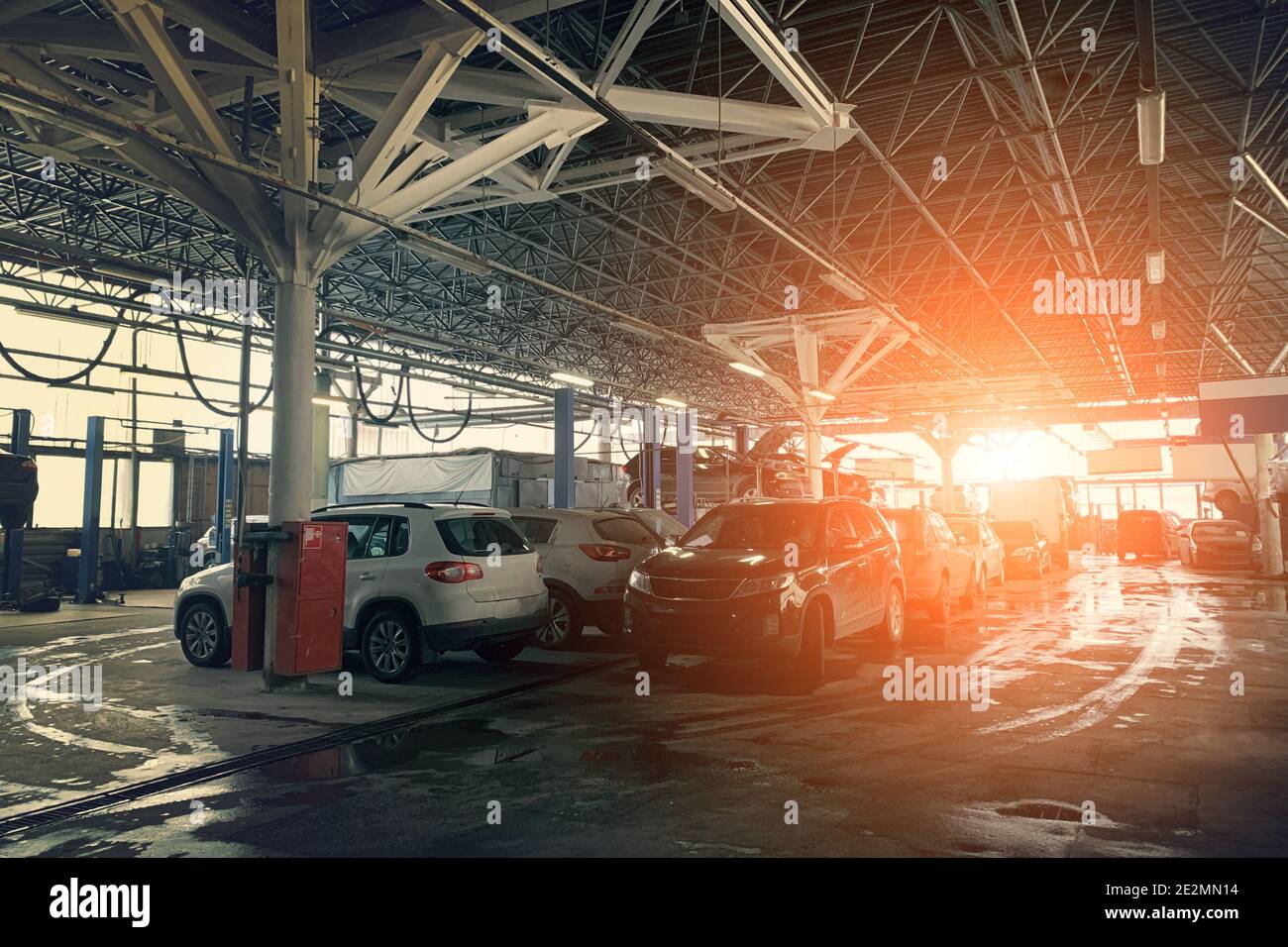 Autoservice garage center or car repair service shop with many cars for diagnostic and maintenance. Stock Photo