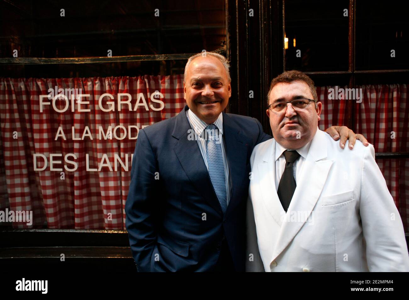 The owners Thierry de la Brosse and Louis Gadby pose in front of L'Ami Louis restaurant in Paris, France December 11, 2009. Photo by Jean-Luc Luyssen/ABACAPRESS.COM Stock Photo