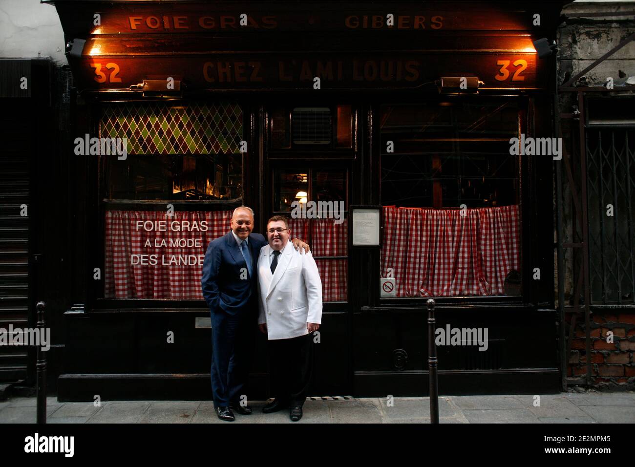 The owners Thierry de la Brosse and Louis Gadby pose in front of L'Ami Louis restaurant in Paris, France December 11, 2009. Photo by Jean-Luc Luyssen/ABACAPRESS.COM Stock Photo