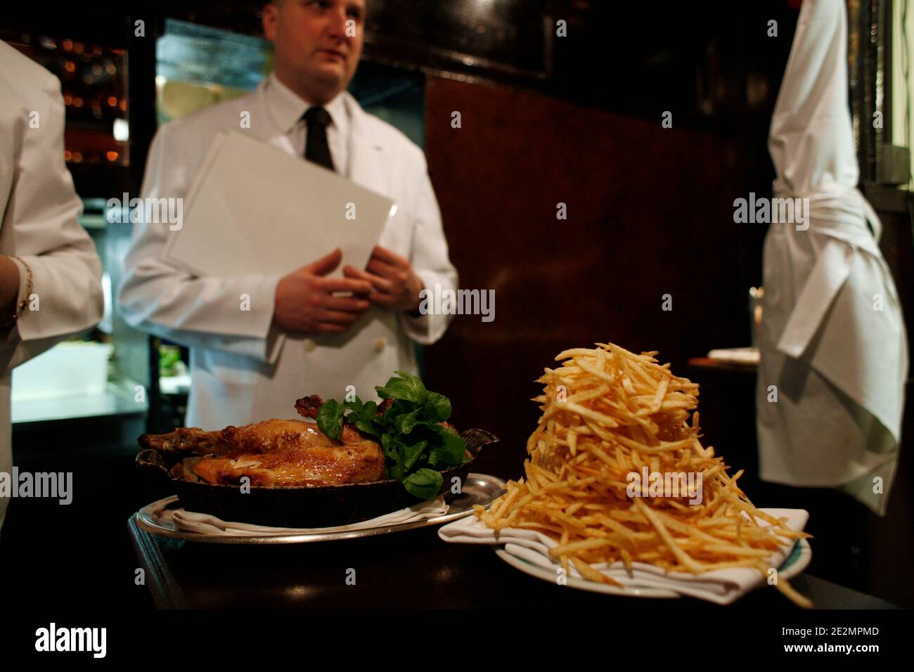 View of roast chicken and chips at L'Ami Louis restaurant in Paris, France January 28, 2010. Photo by Jean-Luc Luyssen/ABACAPRESS.COM Stock Photo
