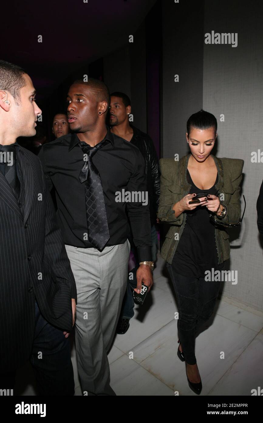 Kim Khardashian and Reggie Bush attend the P Diddy Super Bowl party in