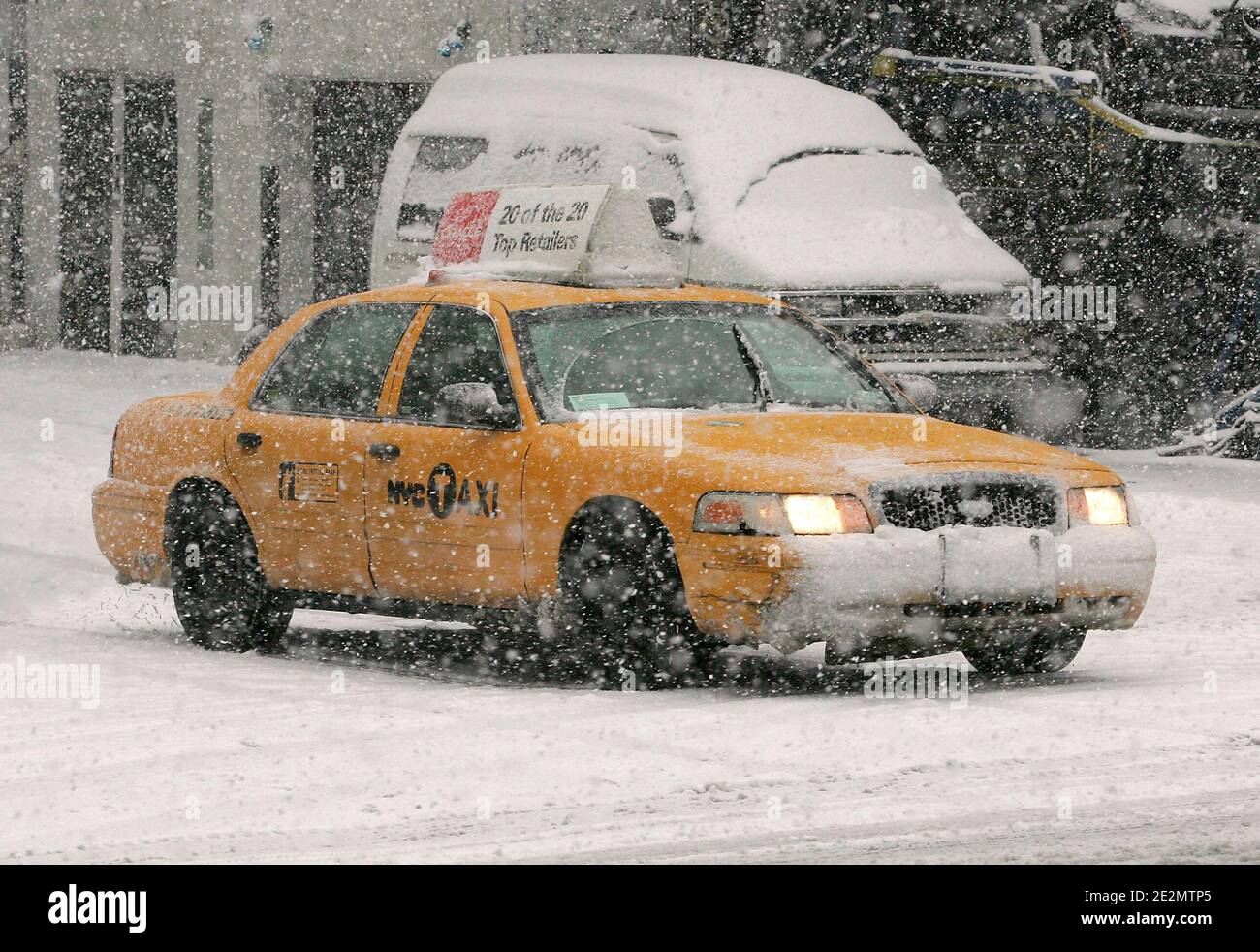A yellow cab under the snow during a blizzard in Soho, New York, NY on February 10, 2010. Photo by Charles Guerin/ABACAPRESS.COM Stock Photo