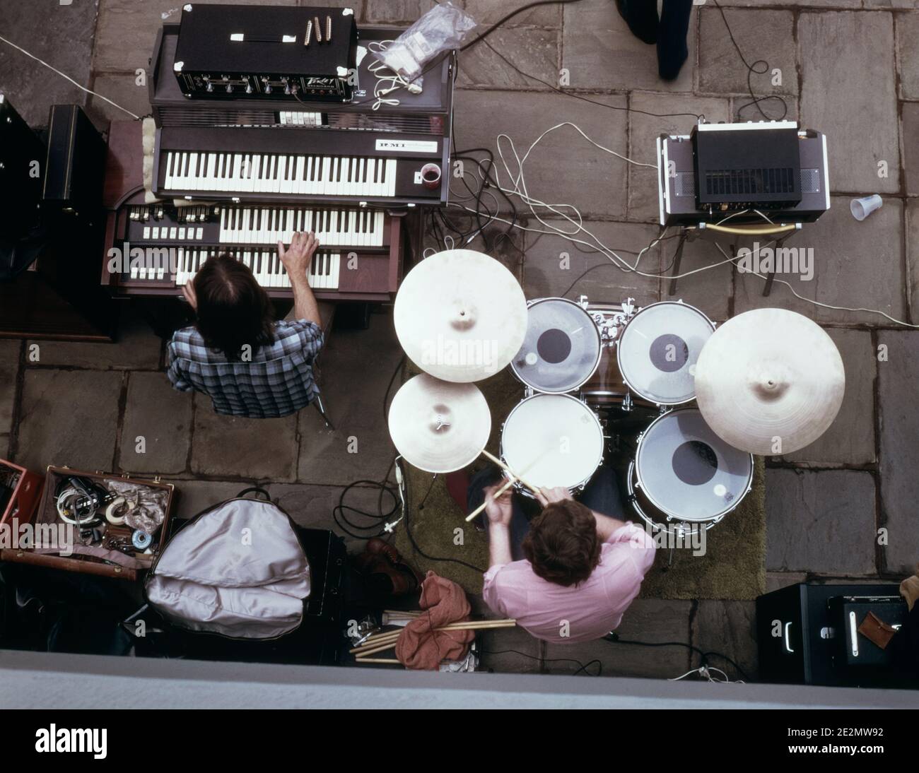 1970s OVERHEAD VIEW ROCK BAND ANONYMOUS KEYBOARDIST AND DRUMMER PLAYING